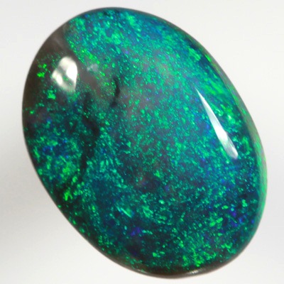 SOLID BLACK OPAL Pinfire patterm. Bright, rich forest green and turquoise green